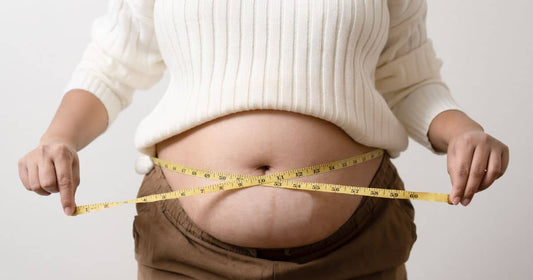 Measuring waist size as a check for excess belly fat.
